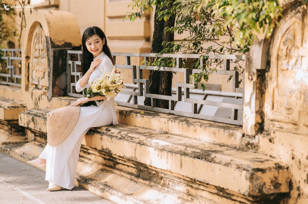 Phái đẹp xúng xính áo dài chụp ảnh ngoại cảnh tại Hà Nội